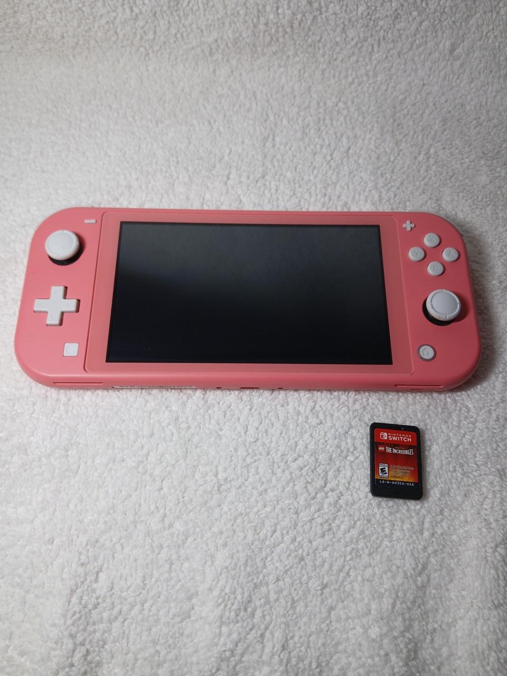 Nintendo Switch Lite Coral Pink Handheld Console Plus One Game.#nintendo